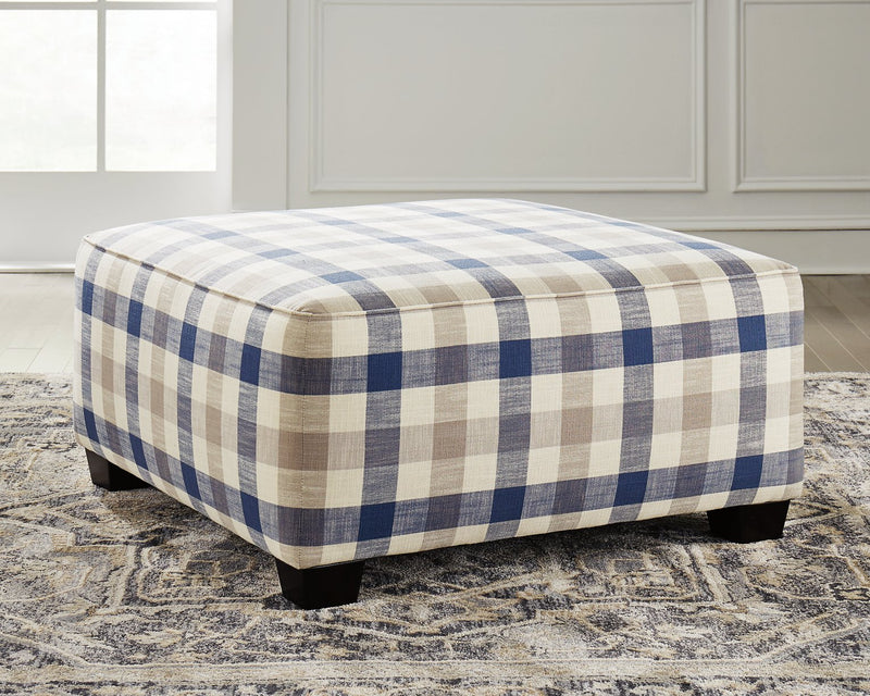 Meggett Benchcraft Ottoman image