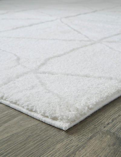 Scarrit 7'10" x 9'10" Rug - Dream Furniture Outlet