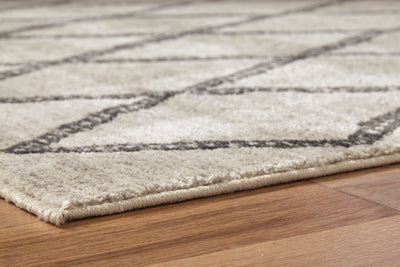 Jarmo 7'10" x 9'10" Rug - Dream Furniture Outlet