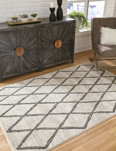 Jarmo 7'10" x 9'10" Rug - Dream Furniture Outlet